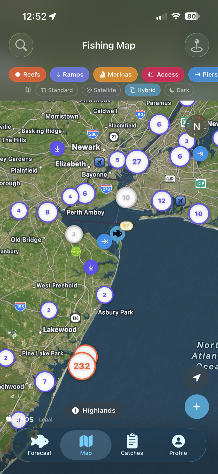 Fish & Tides interactive fishing map showing reefs, ramps, marinas, and tide stations